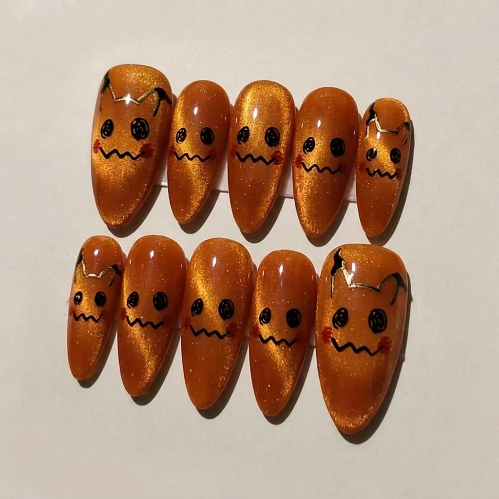 Creepy Cute Pumpkin Cat Eye Nails